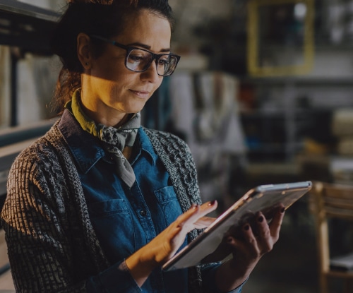 woman using cavallo inventory solutions on tablet